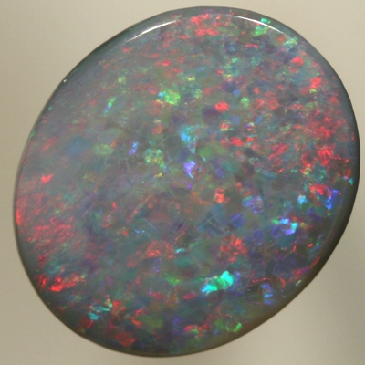 SOLID SEMI BLACK OPAL Sparkles of red over blue with a touch of green